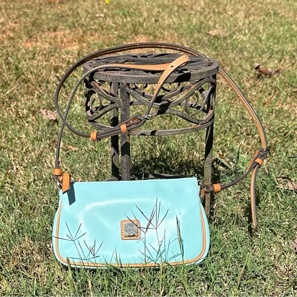 Like new condition Dooney & Bourke Wexford Pale Blue Leather Crossbody!